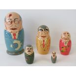 A set of five Russian nesting dolls (matryoshka), each depicting a different political leader,