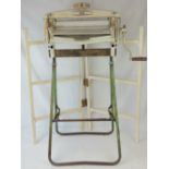 An early 1960s Acme wringer mangle on folding frame and in original condition,