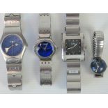 Four stainless steel Storm watches.