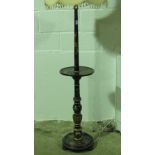 A fine chinoiserie style lamp standard with integral circular table,