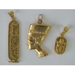 A 9ct gold Nefertiti pendant, hallmarked 375,