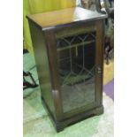 An old charm style glazed front cabinet with single door, standing 98cm high.