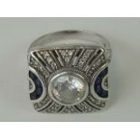 A delightful Art Deco style silver cocktail ring set with blue and white stones, size K.