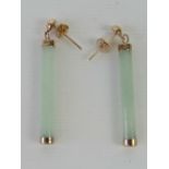 A pair of 9ct gold and jade earrings,