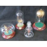 Four art glass decorative models including Spitfire, air balloon and ship.