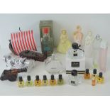 A quantity of perfume bottles including a number of vintage Avon bottles; Viking ship, ladies,