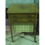 A delightful 19th century mahogany sewing table having twin frieze drawers and slide out sewing