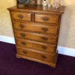 A fine quality contemporary 'Royal Oak' chest of two short over four long graduated drawers,