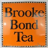 A superb vintage orange ground Brooke Bond Tea enamelled advertising wall sign, 102 x 102cm.