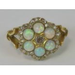 An impressive 18ct opal and diamond ring,