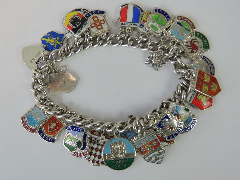 A silver charm bracelet with hallmarked