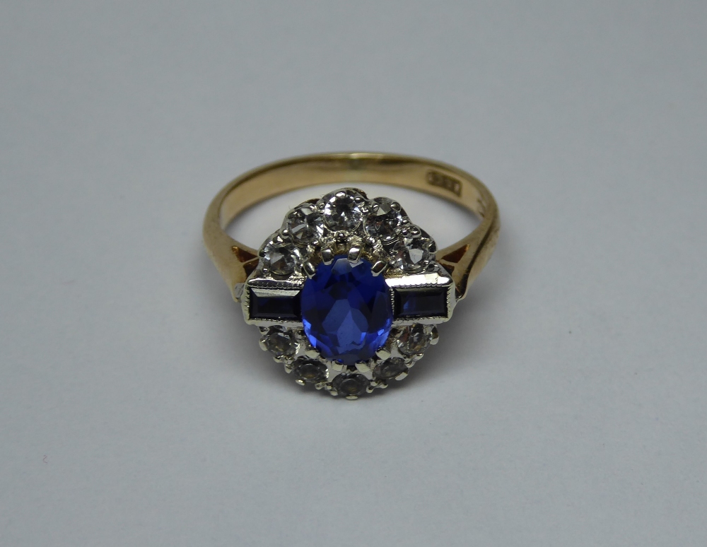 A deco style 9ct gold blue and white sto