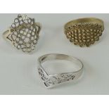 A silver wishbone shaped filigree ring s