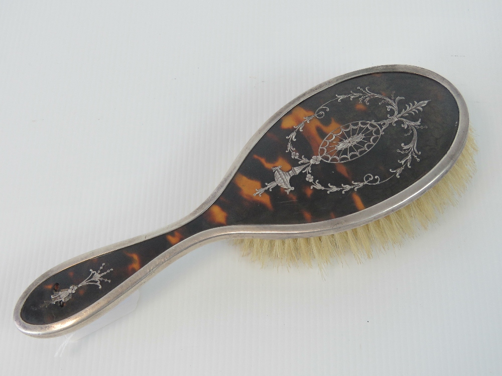 A HM silver hairbrush with tortoiseshell