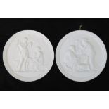 A pair of mid 19th Century bisque relief