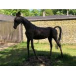 A sculpted freestanding full size equine