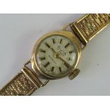 A vintage 9ct Avia ladies wristwatch having 9ct gold bark effect bracelet strap, hallmarked 375,