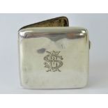 A HM silver cigarette case having gilt interior and hallmarked Birmingham 1921,