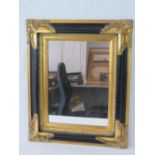 A contemporary rectangular wall mirror in gilt and ebonised frame, 48 x 58cm.