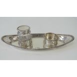 A HM silver standish ink stand having pierced decoration and original glass and silver inkwell