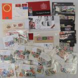 Stamps; a quantity of assorted loose stamps, a medallion first day cover, book of queens stamps,