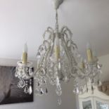 A eight arm Venetian style crystal glass chandelier complete with glass drops, 101cm to ceiling.