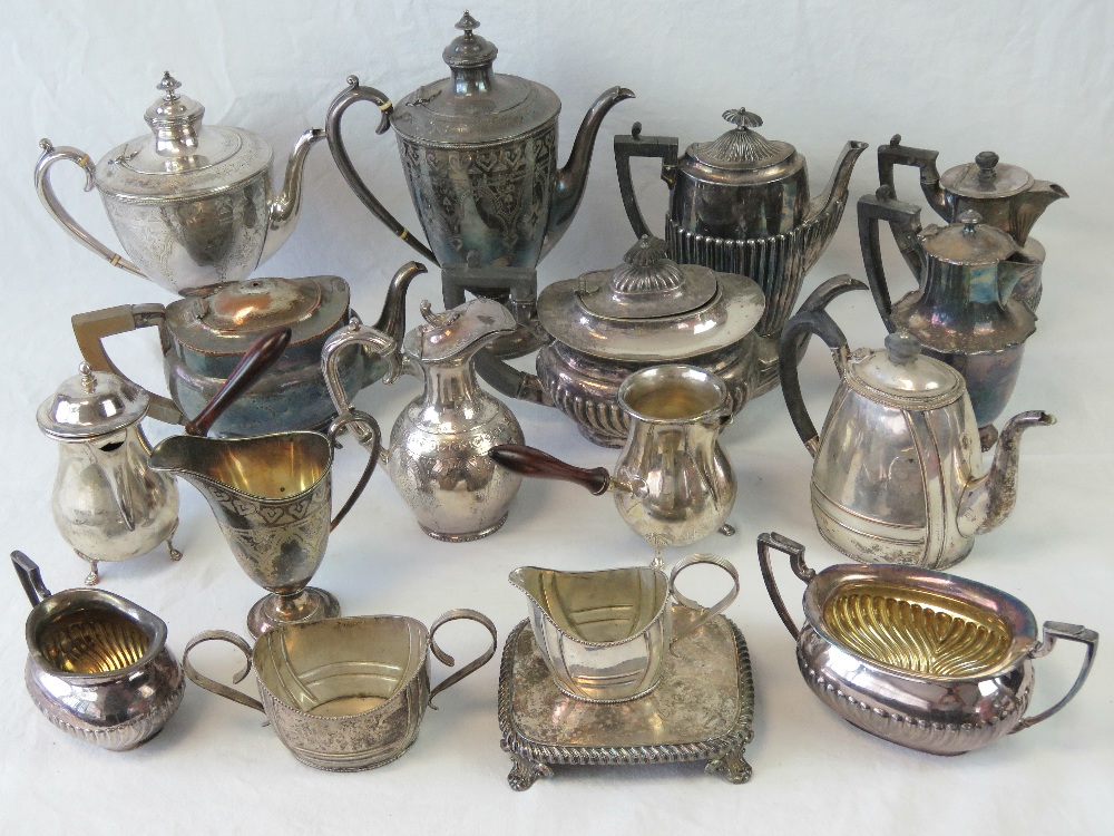 A large quantity of 19th and 20th century silver plated teapots, coffee pots, hot chocolate pots,