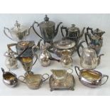 A large quantity of 19th and 20th century silver plated teapots, coffee pots, hot chocolate pots,
