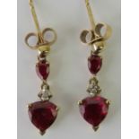 A pair of 9ct gold diamond and ruby earrings,