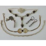 A silver and garnet cabachon necklace,