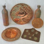 A pair of copper flasks complete with stoppers, together with two copper covered plaques,