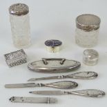 A small collection of HM silver dressing table items including; four piece manicure set,