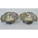 A pair of HM silver bonbon dishes in the form of hearts and having pierced decoration,