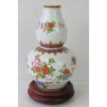 A Kaiser Kanton double gourd porcelain vase having floral decoration upon, 24cm high,