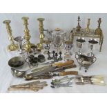 A quantity of assorted brass and silver plated wares including; candlesticks, trivet, cutlery,