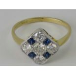 An 18ct sapphire and diamond ring having central round brilliant cut diamond surrounded by