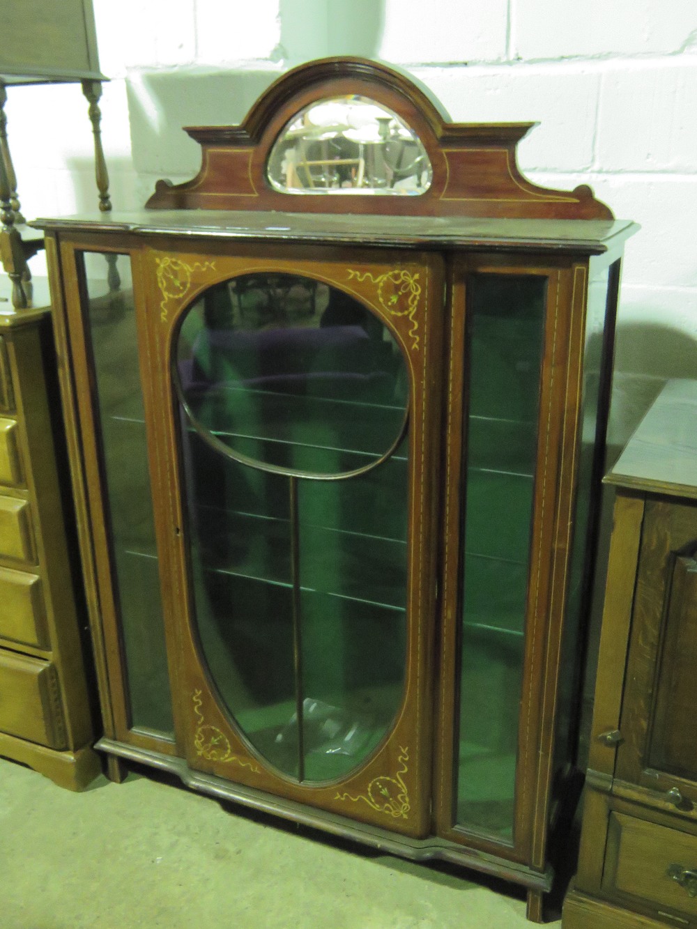 A good Edwardian glazed mahogany veneered display cabinet,