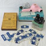 A vintage Viewmaster stereoscope with original box and complete with photo discs,