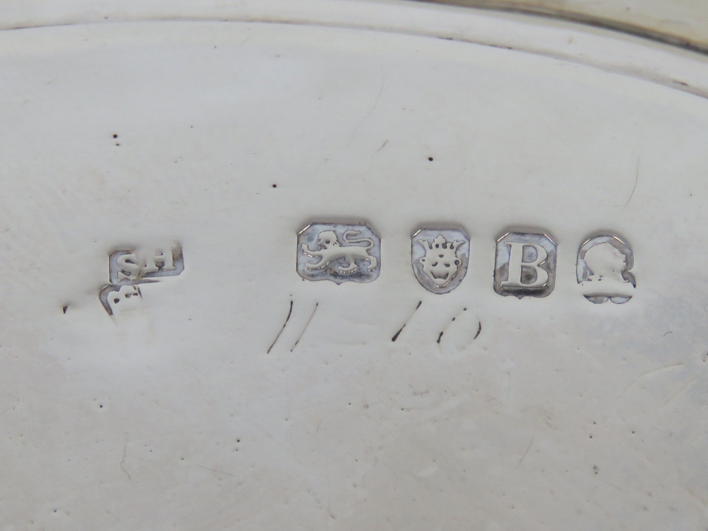 A Georgian HM silver salver raised over three shaped feet, - Image 3 of 3