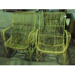 A pair of bamboo armchairs.