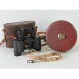 A cased pair of French 8x26 'Premier' binoculars,