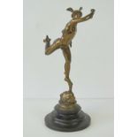 An early 20th century gilt patinated statue of Mercury in flight supported by one of the Anemoi,