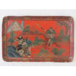 A red ground lacquered tray having painted Mongolian warriors on horseback and forest scenery upon,