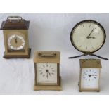 A British made key wind clock in twisted metal frame, together with three Quartz carriage clocks.