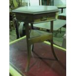 A small hexagonal table having dummy drawers with brass drop handles,