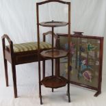 A mahogany piano stool with hinged music seat,