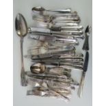 A quantity of silver plated Kings pattern cutlery and flatware including basting spoon, etc.