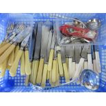 A quantity of assorted cutlery including large silver plated ladle, fisk knives and forks,
