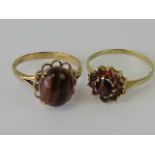 Two 9ct gold rings; one having garnet daisy cluster hallmarked 375, size R,