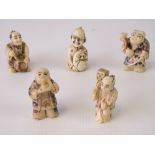 Five carved and stained 19th century ivory netsuke figurines, various forms,